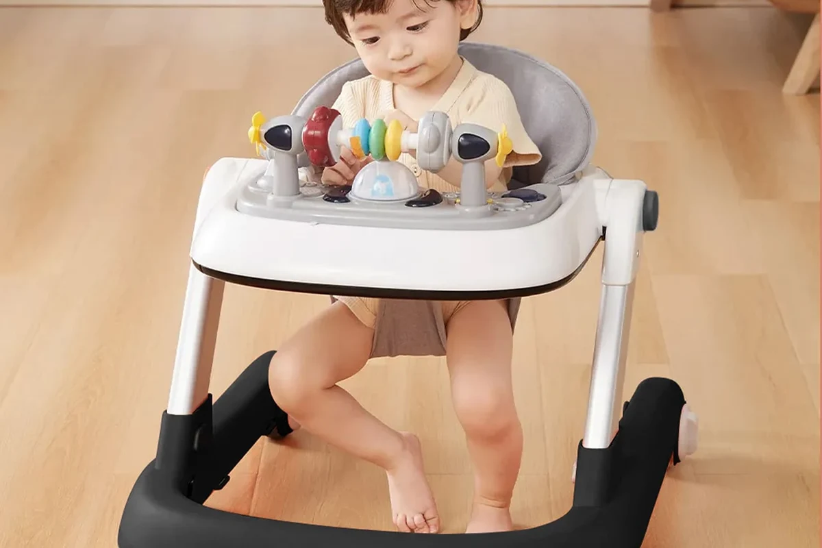Baby practicing supported standing and cruising beside stable furniture in a safe home setting