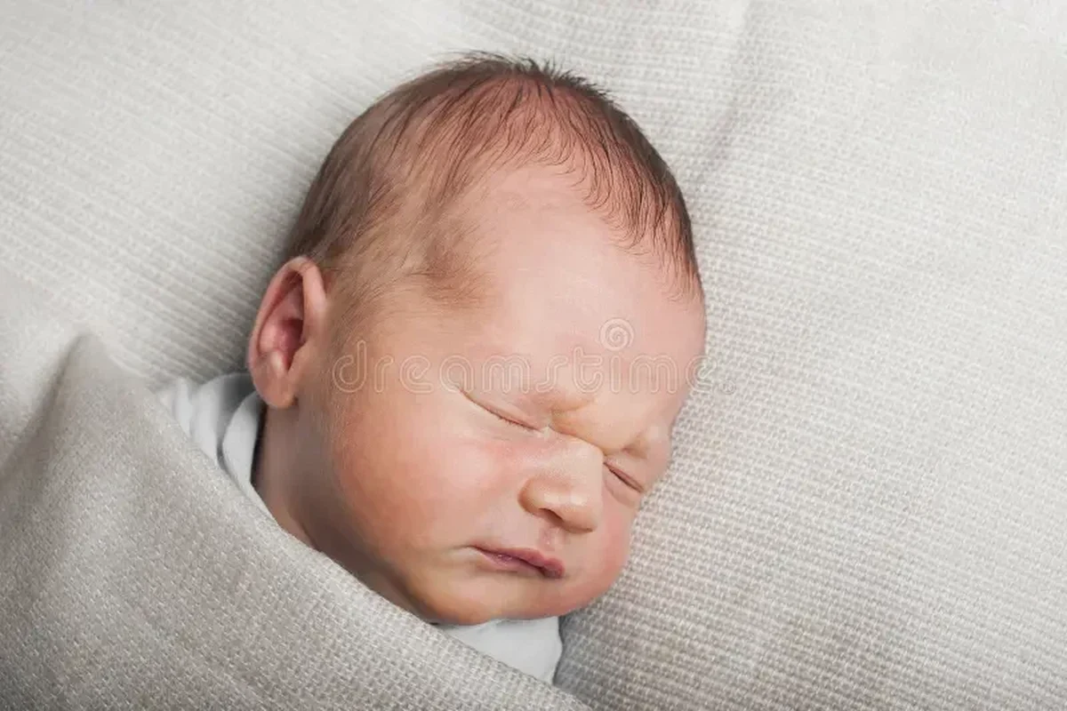 Three-week-old newborn sleeping peacefully in a safe nursery setup
